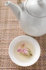 Bowl of rose tea — Stock Photo