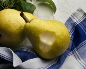 Two Pears on Dish Towel — Stock Photo