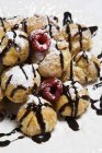 Profiteroles with Chocolate Syrup — Stock Photo