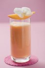 Glass of mango smoothie — Stock Photo