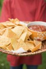 Tray of nachos and salsa — Stock Photo