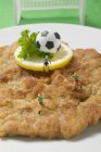 Veal escalope with figures — Stock Photo