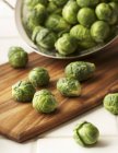 Brussels Sprouts Spilling From Colander — Stock Photo