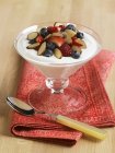 Yogurt with berries and almonds — Stock Photo