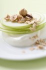 Yoghurt with apple slices — Stock Photo