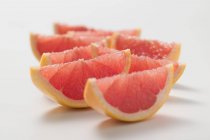 Wedges of pink grapefruit — Stock Photo