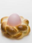 Easter egg in bread — Stock Photo