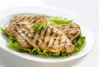 Grilled chicken breast slices — Stock Photo