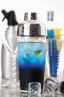 Closeup view of cold Blue Curacao cocktail in shaker — Stock Photo