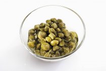 Pickled Capers in glass bowl — Stock Photo