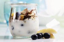 Yoghurt with muesli — Stock Photo