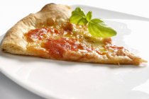 Pizza with basil and tomato sauce — Stock Photo