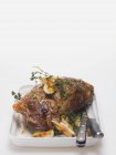 Roasted Lamb shank with garlic and thyme — Stock Photo