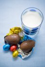Eggs and glass of milk — Stock Photo