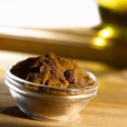 Curry powder in glass dish — Stock Photo