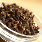 Cloves in glass dish — Stock Photo