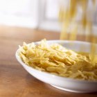 Raw Farfalle pasta — Stock Photo