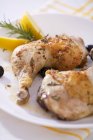 Chicken legs with olives and rosemary — Stock Photo