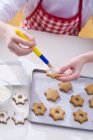 Christmas biscuits on tray — Stock Photo