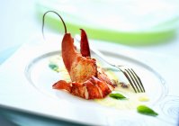 Closeup view of lobster on pineapple carpaccio — Stock Photo