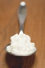 Spoonful of cottage cheese — Stock Photo