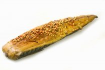 Closeup view of smoked mackerel fillet with spices — Stock Photo