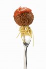 Pasta and meatball on fork — Stock Photo