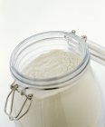 Wheat flour in preserving jar — Stock Photo
