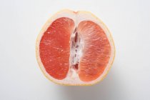 Half pink grapefruit — Stock Photo