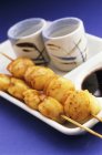 Closeup view of scallop kebabs on skewers — Stock Photo