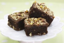 Chocolate brownies with chopped nuts — Stock Photo
