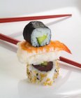 Maki, nigiri and inside-out sushi rolls — Stock Photo