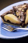 Sliced Chocolate and pear tart — Stock Photo