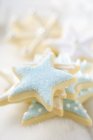 Biscuits with blue and white icing — Stock Photo