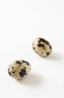 Quails eggs on white — Stock Photo