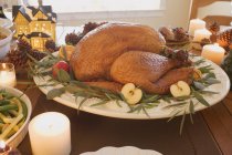 Roast turkey on Christmas table — Stock Photo