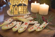 Filled chicory boats for Christmas — Stock Photo