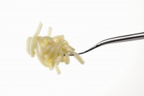 Fresh cooked pasta on fork — Stock Photo