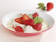 Strawberries in mascarpone cream — Stock Photo