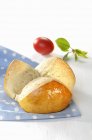 Closeup view of Osterpinze yeast bun with colored red egg for Easter — Stock Photo