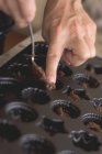 Hans Putting chocolate mixture — Stock Photo
