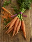 Bunch of baby carrots — Stock Photo