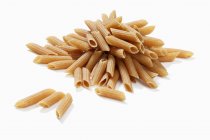 Wholemeal penne rigate pasta — Stock Photo