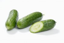Three green cucumbers — Stock Photo
