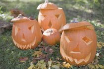 Carved pumpkin faces — Stock Photo