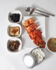 Kimchi with side dishes and rice — Stock Photo