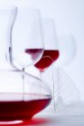 Glass of red wine and carafe — Stock Photo