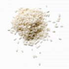 Riz à grains courts déversé — Photo de stock
