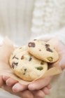 Female Hands holding cookies — Stock Photo