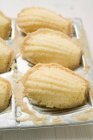 Baked Madeleines in baking tin — Stock Photo